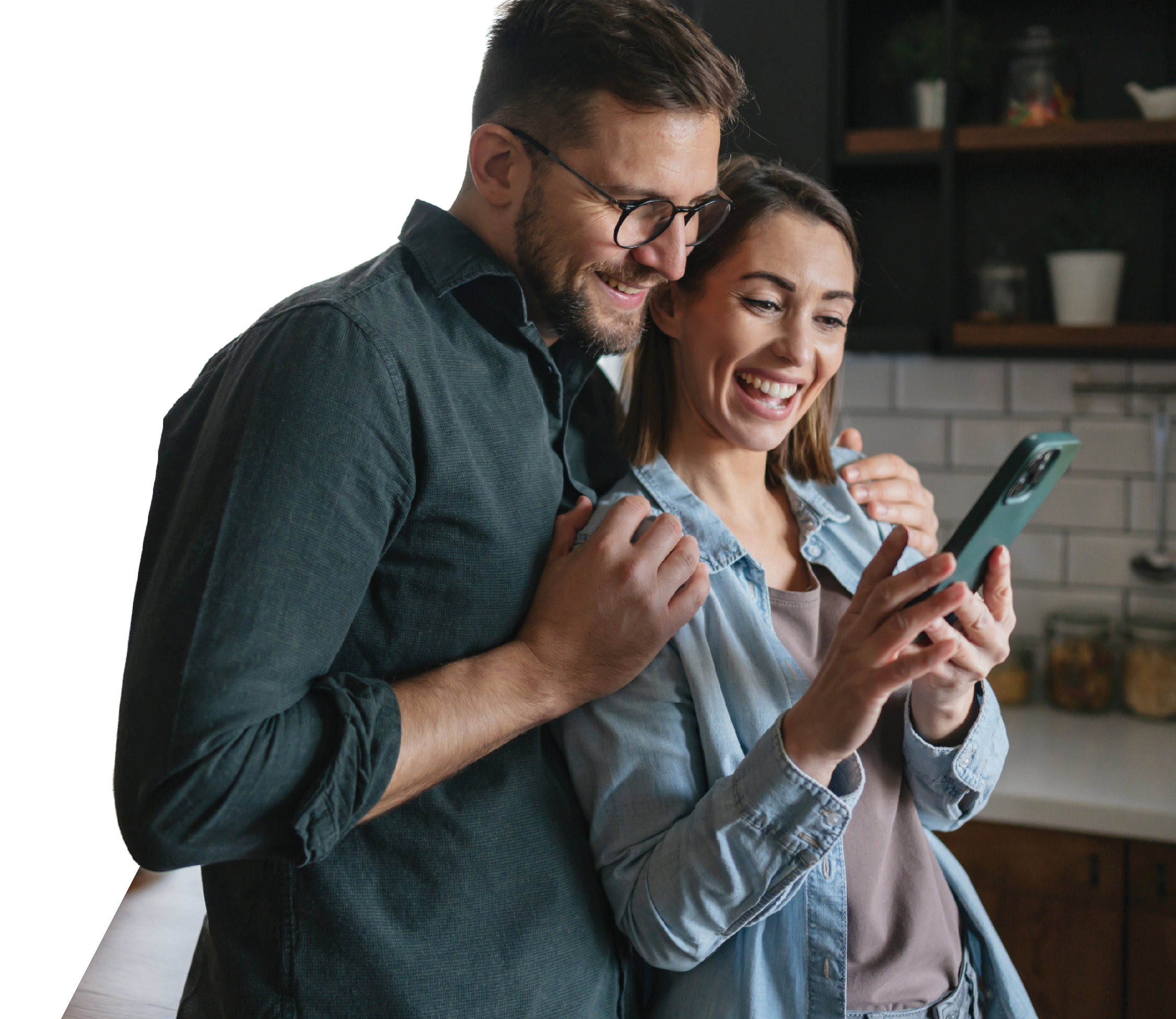 Couple looking at phone excited about home listings